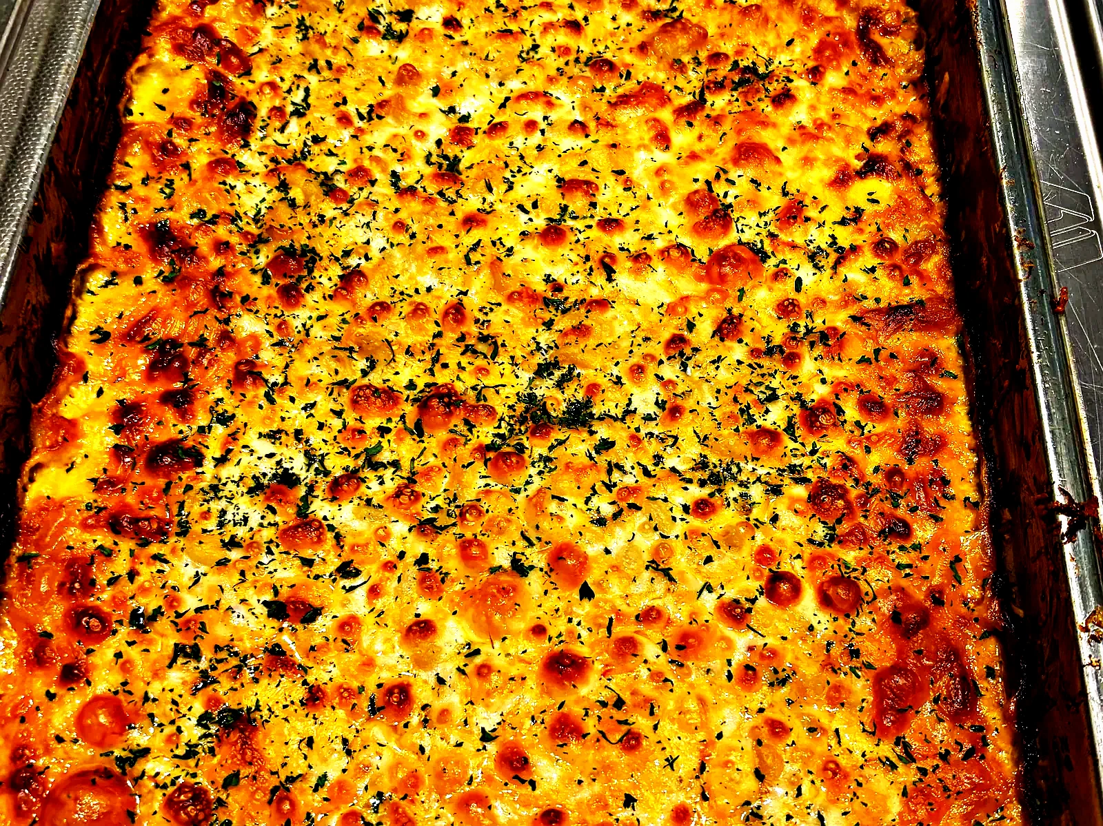 Full pan of baked macaroni and cheese