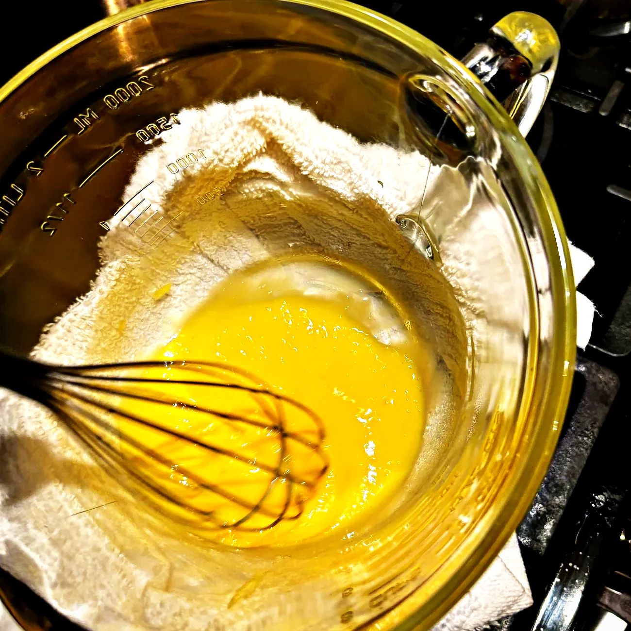 Egg yolks whisked over a water bath